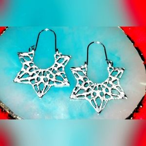 New Pair of silver half star dangle earrings.